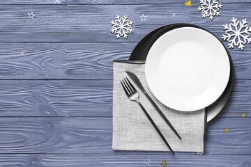 Beautiful Christmas table setting on color wooden background
