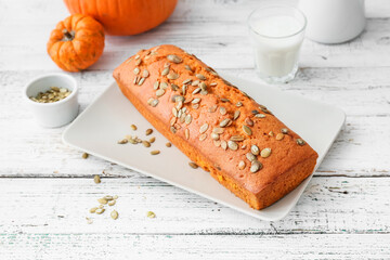 Tasty pumpkin pie on table