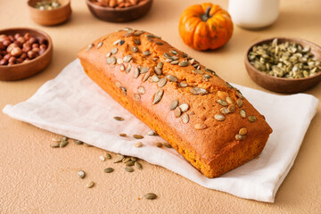 Tasty pumpkin pie on color background