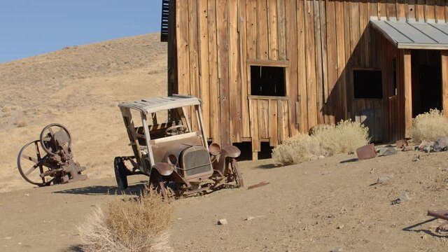 Old Car and Building at Nevada Ghost Town in the Desert - Shallow Depth of Field