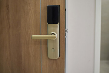 Digital door lock security systems for good safety of apartment door. Electronic door handle with key pads numbers. Selective focus