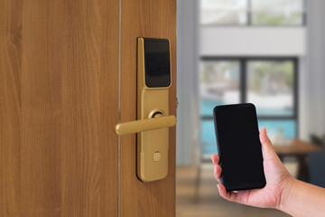 Hotel door security Unlocking by application on mobile phone. Digital door lock, keyless system of...