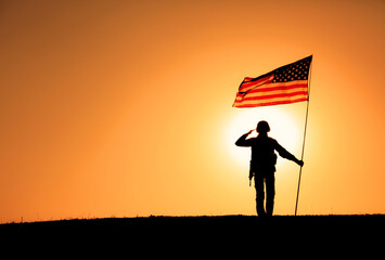 Silhouette of USA armed forces soldier, army infantryman or Marine Corps fighter veteran saluting...