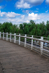 Fototapeta na wymiar wooden floor and railings in the park