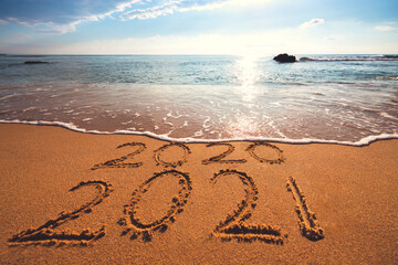 Happy New Year 2021 concept on the sea beach; sunrsie shot