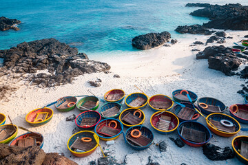 Be island ( small island, Bo Bai island ) with local colorful basket boats at Ly Son island, Quang Ngai Province, Viet Nam