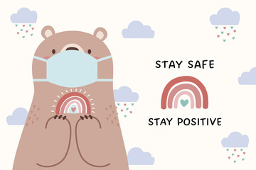 Cute cartoon bear wearing a face mask and holding a rainbow. Cute bear character sends a positive message during the pandemic. For poster, sign, greeting card, and more.