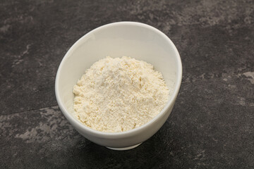 Wheat flour heap in the bowl