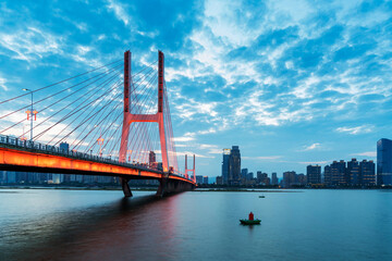 Modern bridge in the city at night