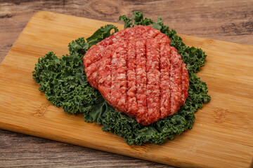 Raw beef burger cutlet for cooking