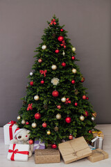 Fototapeta na wymiar New year happy holiday interior Christmas tree decor gifts