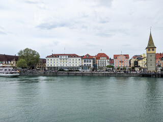 Fototapeta na wymiar Lindau, Germany - May 5 2019: View of Lindau's waterfront