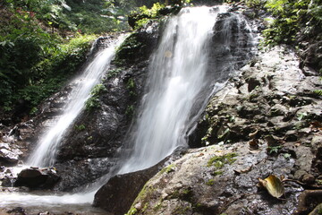 This photo is a natural tourist photo of Curug Kuwung Indah. This waterfall is located in the middle of a tropical forest. the location of Pekalongan, Central Java Indonesia.
