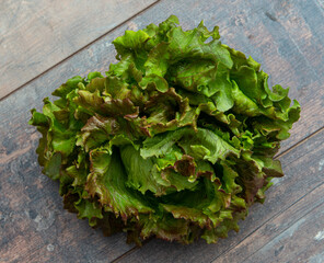  lettuce head over rustic wooden background