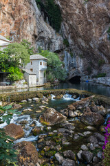 Beautiful view of the Dervish House under the rock in Blagaj. Bosnia and Herzegovina