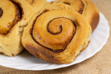 CInnamon Rolls on Box and Plate 
