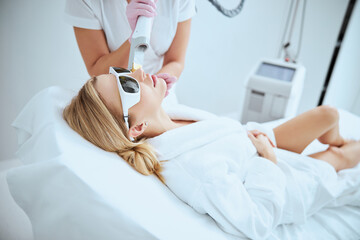 Female patient undergoing a facial rejuvenation procedure
