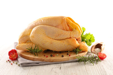 raw whole chicken and ingredients