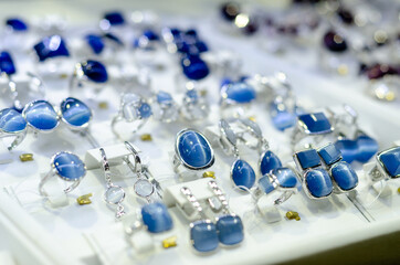 Luxury rings and earrings for sale in the jewelry store.