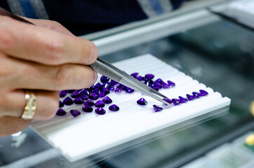 Faceted amethyst gemstone for sale in the jewelry store.