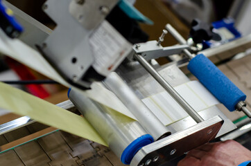 Close-up of Automatic Stickers Machine