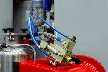 Close-up of polyurethane foam injection machine. - obrazy, fototapety, plakaty