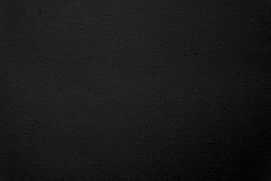 Eco friendly blank black recycled craft paper for the environment to be used as a background or backdrop.