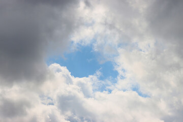 Clearance of the blue sky among the clouds.