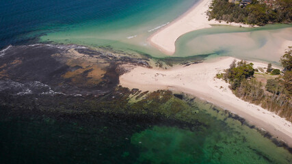 Jervis Bay in Australia. Beautiful blue bay with white sand and picturesque vegetation