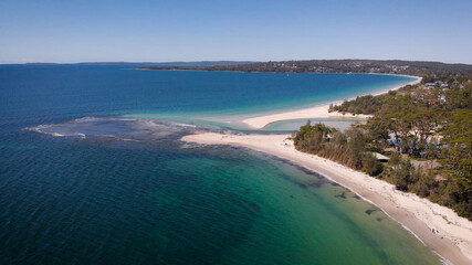 Fototapeta na wymiar Jervis Bay in Australia. Resort in the bay, Pure Blue Lagoon camping and small cabins.