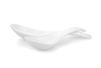 White empty ceramic spoon for soup on white background