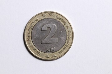 2 KM coin convertible mark. 2000, Bosnia and Herzegovina, obverse top view on a white background