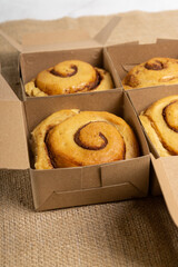 CInnamon Rolls on Box and Plate 