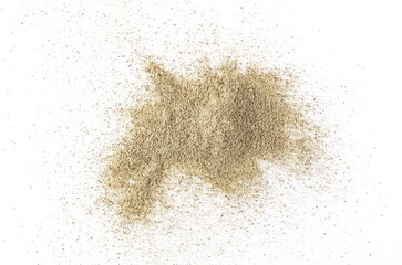 Milled white pepper powder pile, peppercorn isolated on white background, top view