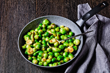 Brussels sprouts on a dark wooden background