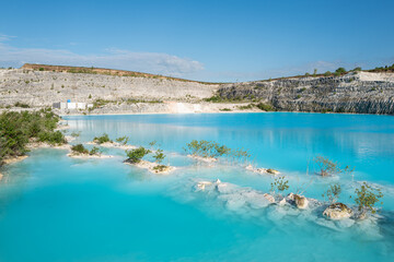 Turquoise water in the lake at Faxe Kalkbrud limestone quarry, Denmark