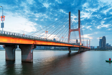 Modern bridge in the city at night