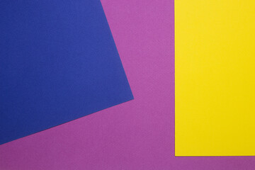 three cards of different colors geometrically placed for collage, invitation, card. yellow, blue and violet