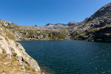 Fototapeta na wymiar Mountainous landscape with lakes and blue sky