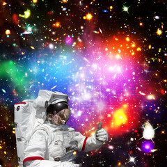Astronaut and galaxy. The elements of this image furnished by NASA.