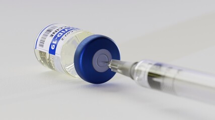 Nahaufnahme einer Spritze, die liegend in einer Impfstoff Flasche f&uuml;r Corona steckt auf wei&szlig;em Untergrund