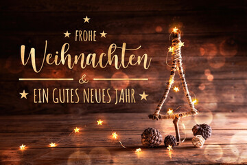 Christmas Tree with fairy lights on rustic wooden background - Rustic Xmas Background - Greeting Card with German text, Christmas Card