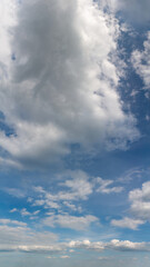 Fantastic clouds against blue sky, panorama