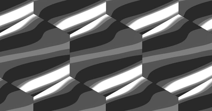Variable spots of black and white shades move in rotating hexagons