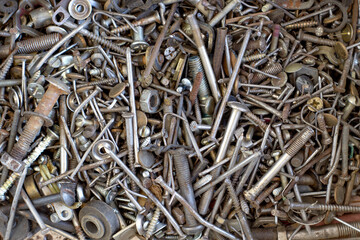 Macro photo of set of screws and nails. Construction abstraction. Industrial background. Screw background, steel screw.