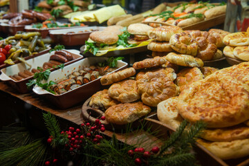 Nice street food shashlik, lavash, kebab, hachapuri and roasted potato on national Christmas Fair in Kiev, Ukraine