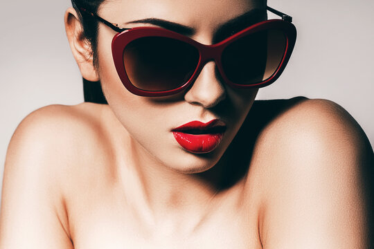 sexy woman in red sunglasses