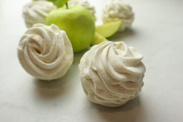 Homemade zephyr with apple taste on light background