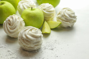 Homemade zephyr with apple taste on light background
