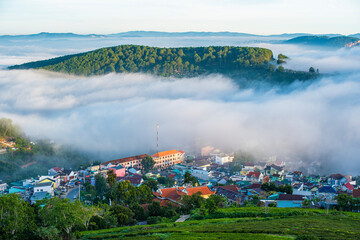 Many houses in in the mist in the morning. Early morning fog and mist burns off over large houses...